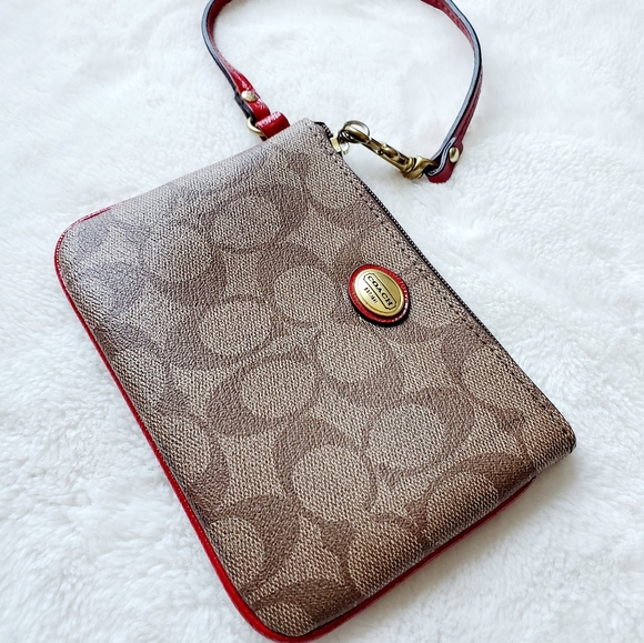 Coach Handbags - COACH monogrammed canvas wristlet wallet